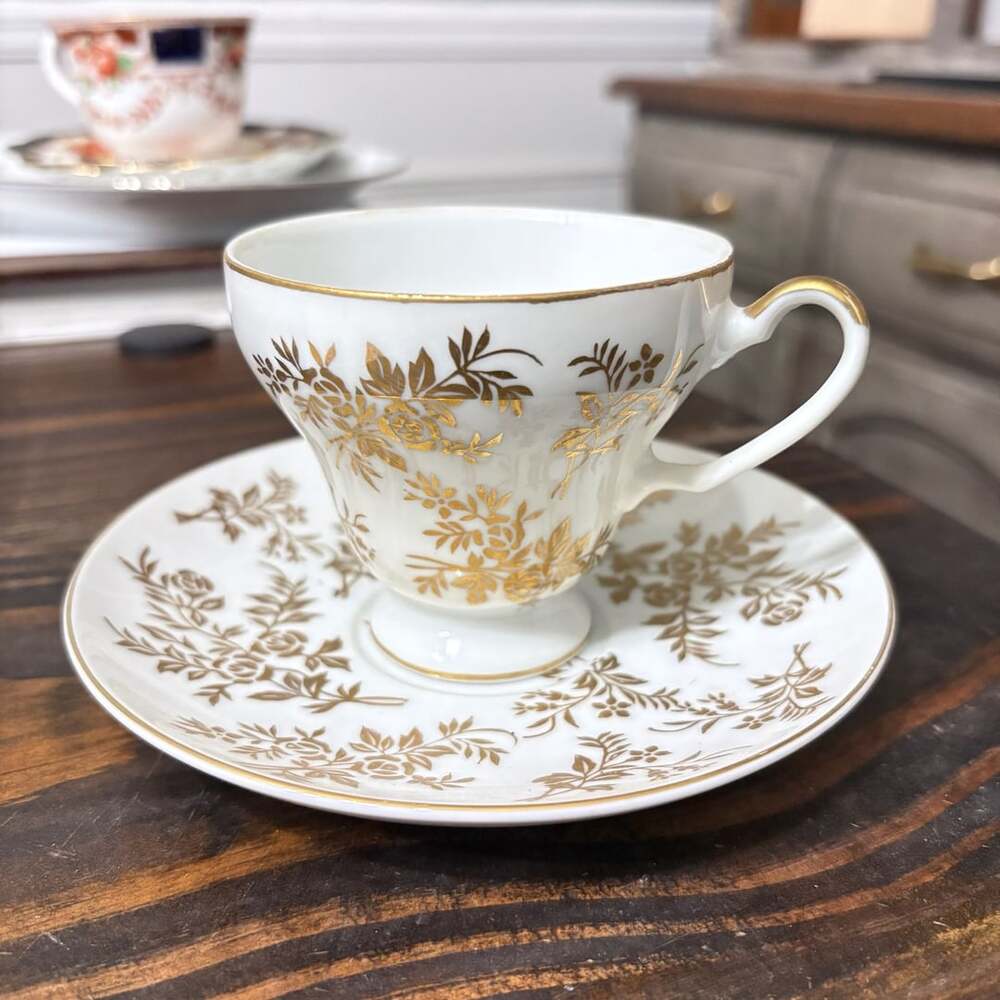 Norcrest Fine China TA-7 Gold Floral Footed Teacup & Saucer